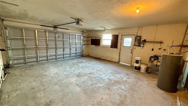 garage with gas water heater and a garage door opener