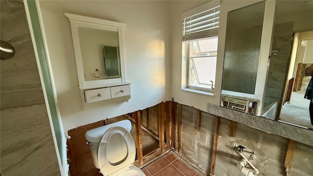 bathroom with tile patterned floors