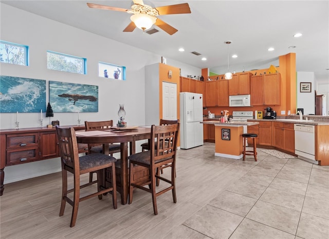 dining room with a ceiling fan, visible vents, and recessed lighting