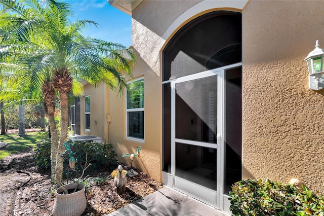 view of home's exterior featuring a sunroom