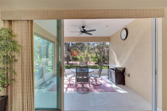 interior space featuring ceiling fan