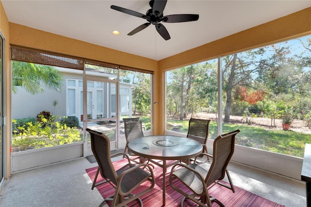 sunroom / solarium with ceiling fan