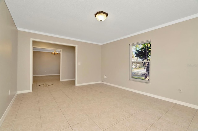 tiled spare room featuring a notable chandelier, crown molding, and a textured ceiling