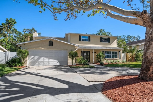 view of front of property with a garage