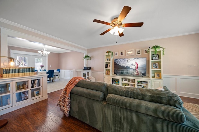 living room with french doors, dark hardwood / wood-style floors, ceiling fan, and ornamental molding