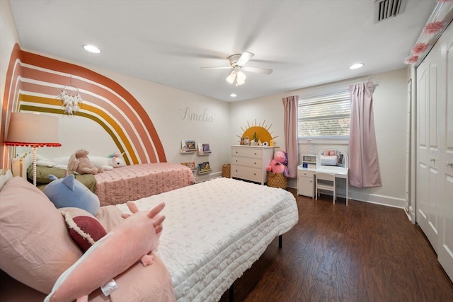 bedroom with ceiling fan, dark hardwood / wood-style flooring, and a closet