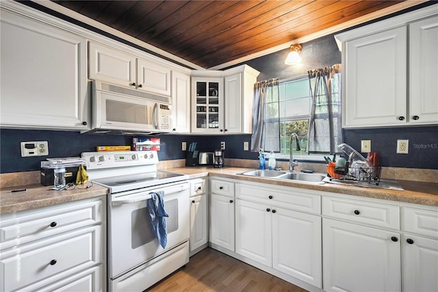 kitchen with white appliances, wooden ceiling, sink, dark hardwood / wood-style flooring, and white cabinetry