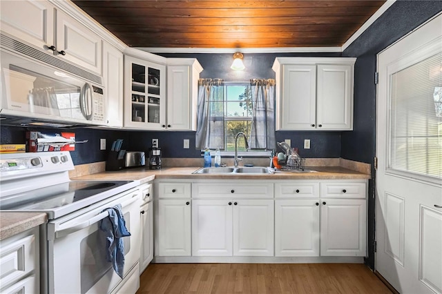 kitchen featuring white cabinetry, sink, wooden ceiling, light hardwood / wood-style flooring, and white appliances