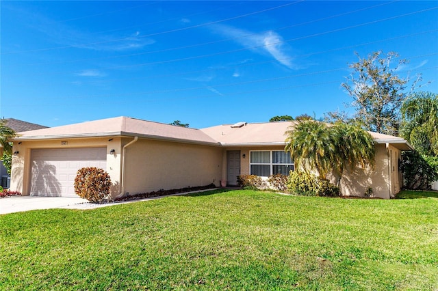 ranch-style home with a garage and a front yard