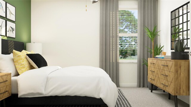 bedroom with carpet and multiple windows