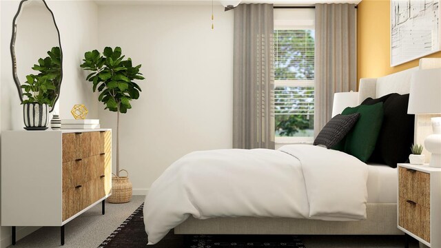 carpeted bedroom featuring multiple windows