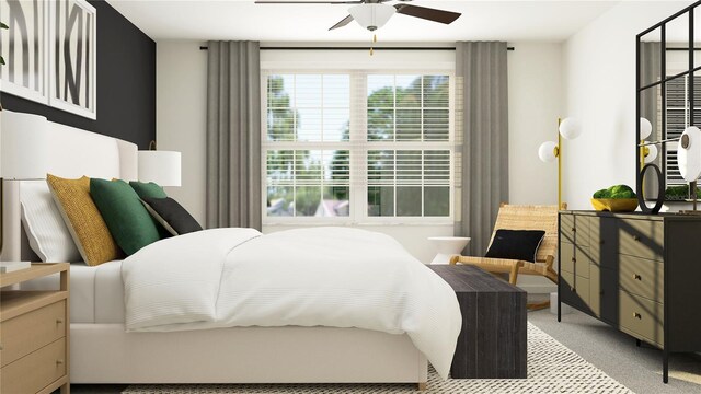 bedroom featuring ceiling fan and light colored carpet