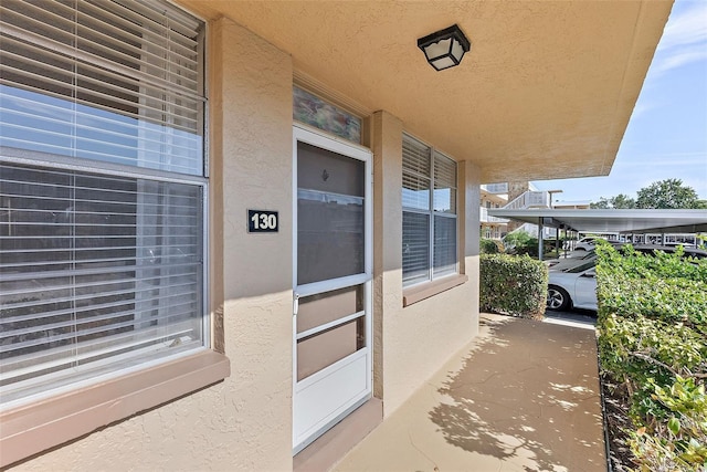 exterior space featuring a carport