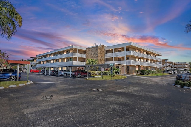 view of outdoor building at dusk