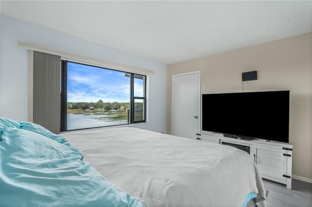 bedroom featuring hardwood / wood-style floors