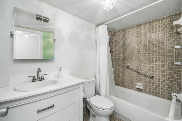 full bathroom with tile patterned flooring, shower / tub combo with curtain, vanity, and toilet