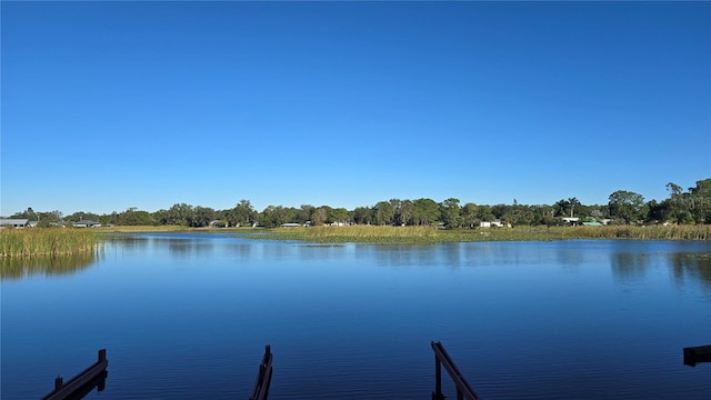 view of dock with a water view