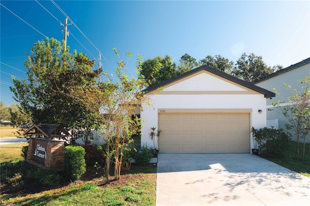 ranch-style home with a garage