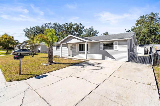 ranch-style home with a front yard