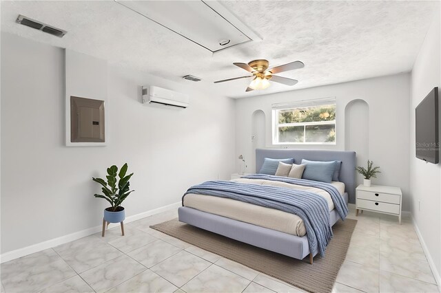 bedroom with a wall unit AC, electric panel, ceiling fan, and a textured ceiling