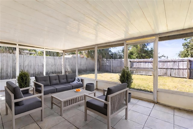 sunroom featuring wooden ceiling