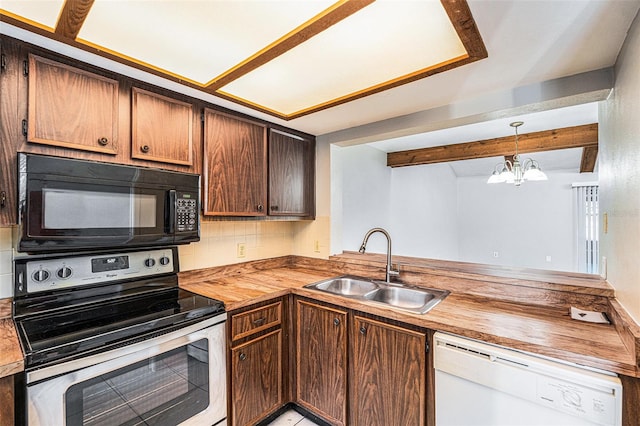 kitchen featuring stainless steel electric range, dishwasher, sink, decorative light fixtures, and butcher block counters