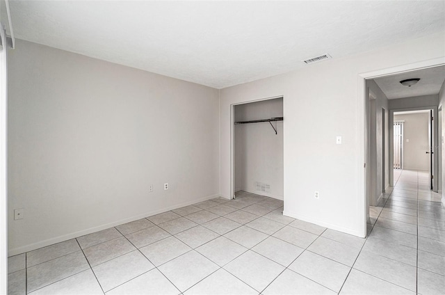 unfurnished bedroom featuring a closet