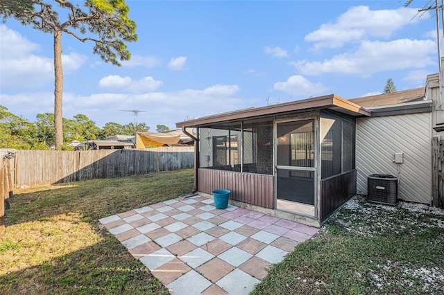 view of patio featuring a sunroom and cooling unit