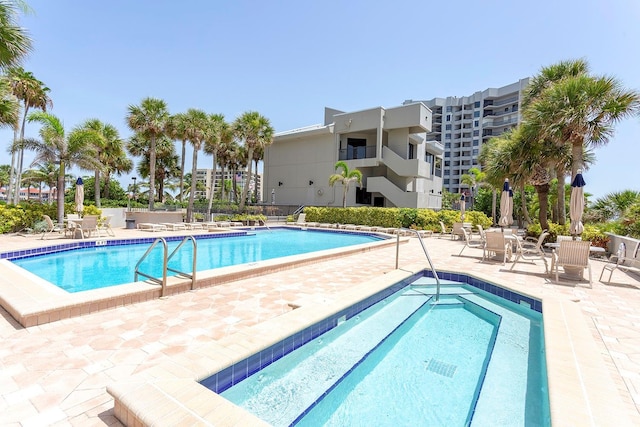 view of pool featuring a patio area