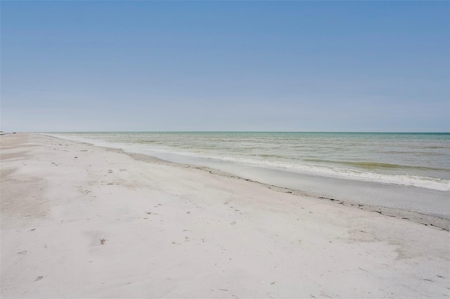 property view of water featuring a view of the beach