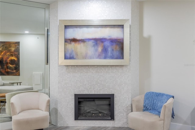 living area with wood-type flooring