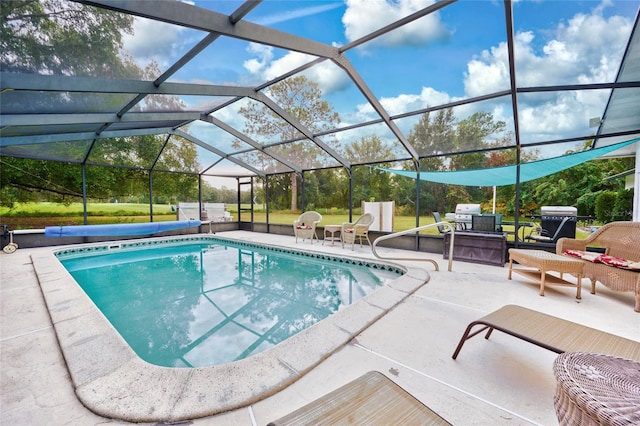 view of pool featuring a lanai and a patio area