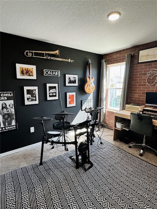 office featuring light carpet and a textured ceiling