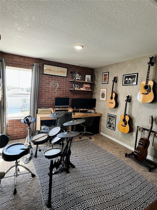 office space featuring carpet, a textured ceiling, and brick wall