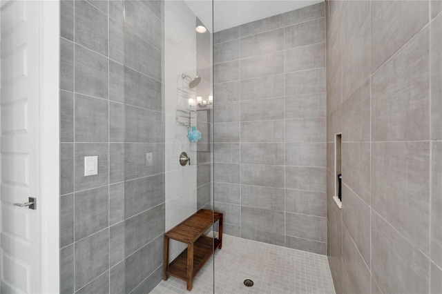 bathroom featuring tiled shower