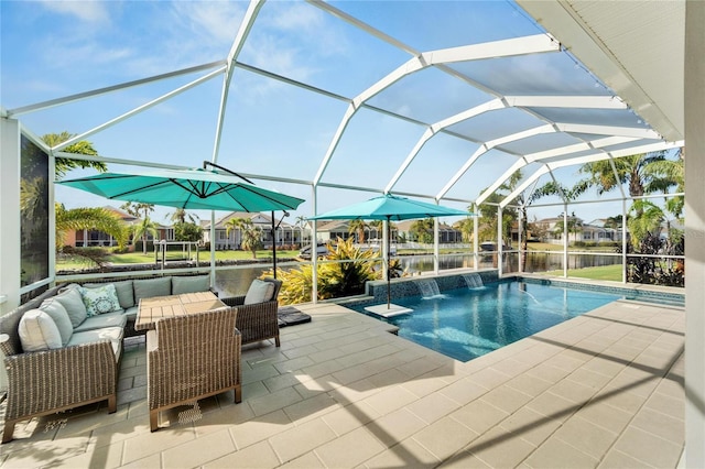 view of swimming pool with outdoor lounge area, a lanai, pool water feature, a water view, and a patio