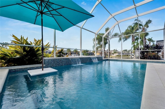 view of pool featuring pool water feature and a lanai