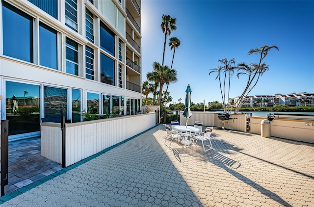 view of patio / terrace featuring a water view