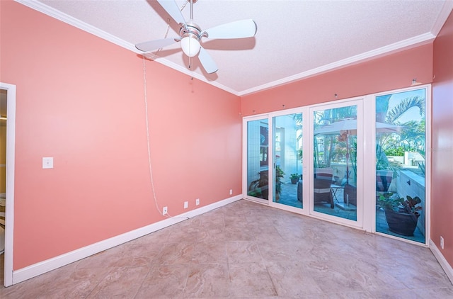 spare room featuring ceiling fan, crown molding, and a textured ceiling