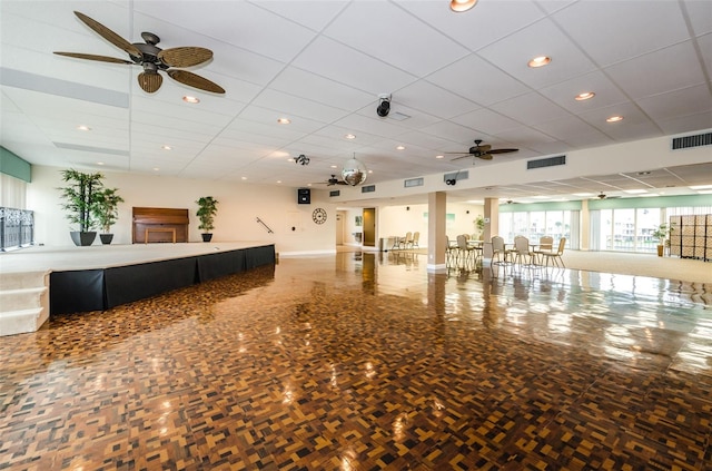 interior space featuring ceiling fan