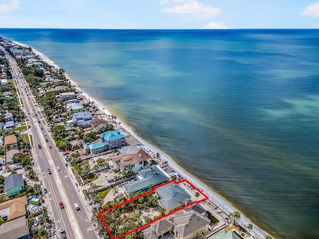 aerial view featuring a beach view and a water view