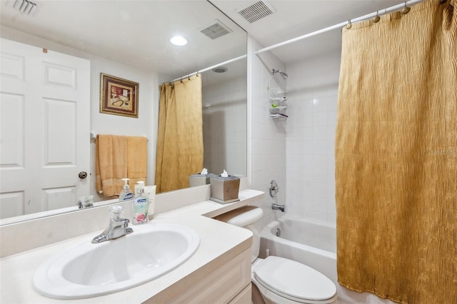 full bathroom with vanity, toilet, and shower / tub combo with curtain