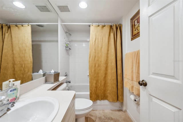 full bathroom featuring vanity, shower / bath combo, and toilet