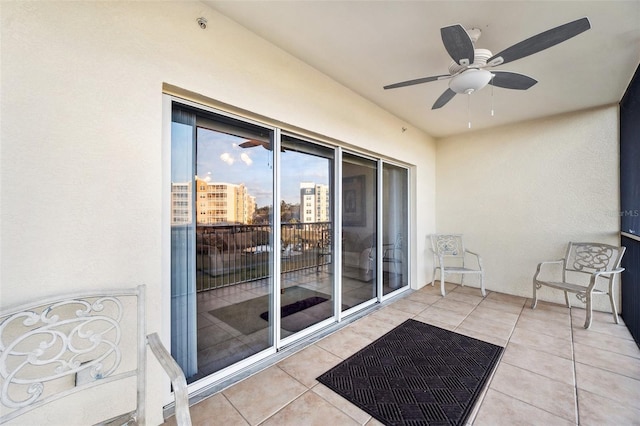 balcony featuring ceiling fan