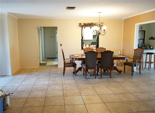 dining area featuring a chandelier, a textured ceiling, crown molding, and light tile patterned flooring