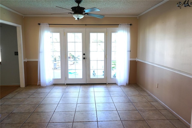 doorway featuring french doors, plenty of natural light, and ceiling fan