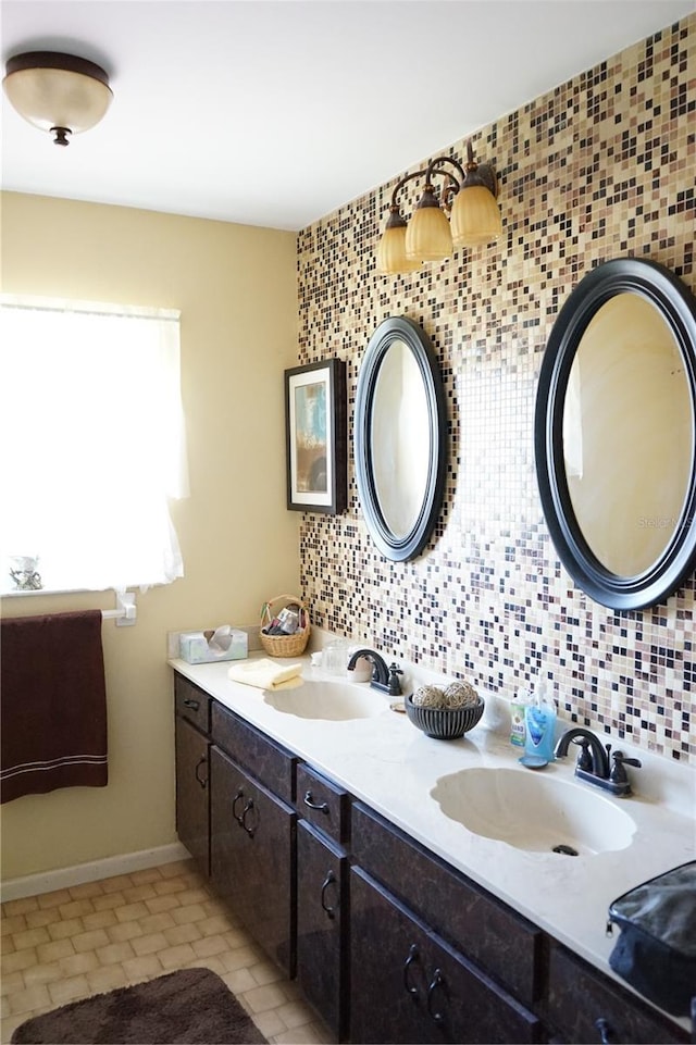 bathroom with backsplash and vanity