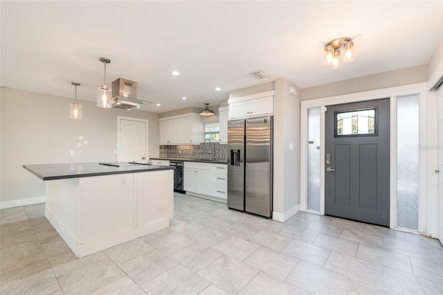 kitchen with white cabinetry, sink, stainless steel fridge with ice dispenser, pendant lighting, and extractor fan