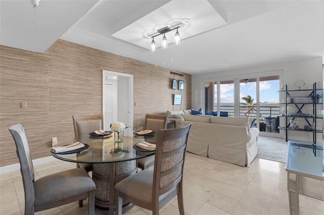 dining room featuring light tile patterned flooring