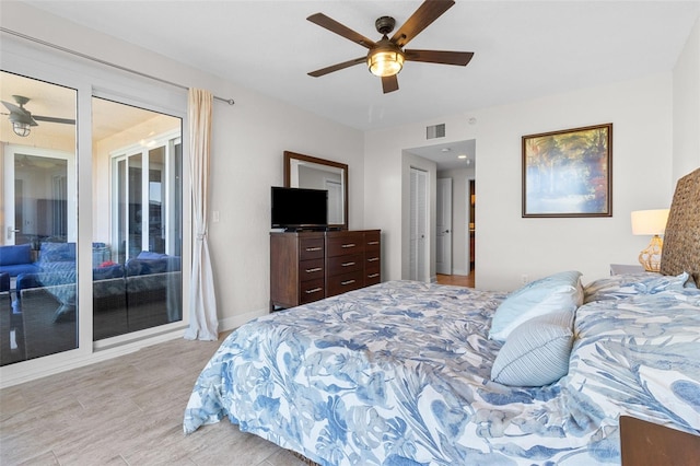 bedroom featuring access to outside and ceiling fan